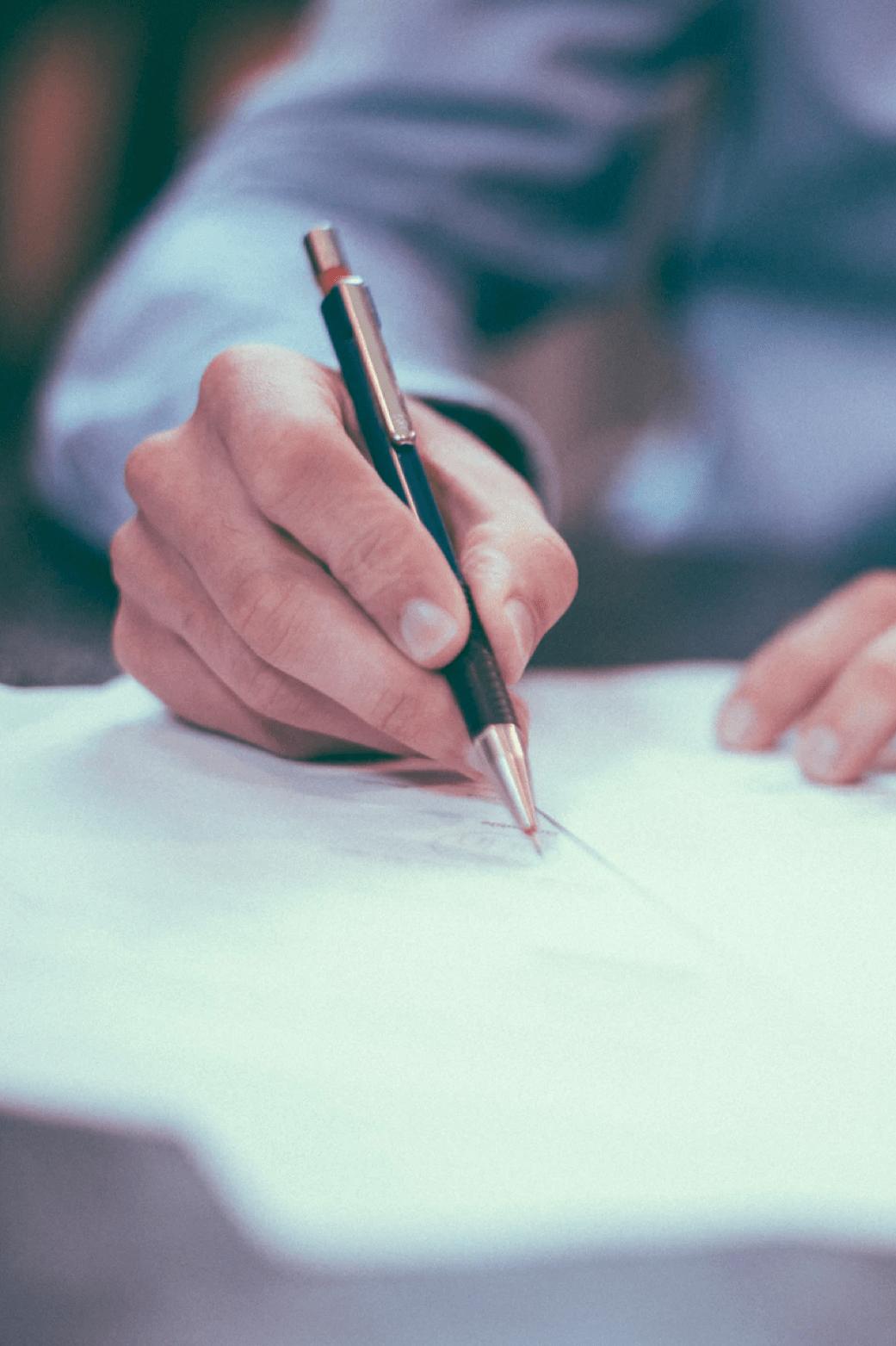 Photo of a hand writing